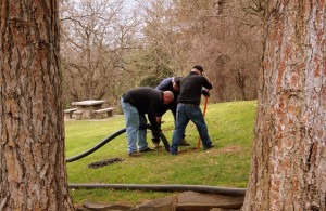 Bishop servicing a septic system in Chamberlain